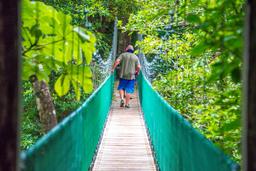 hanging bridge that joins both sides of the river hot springs pools rincon de la vieja